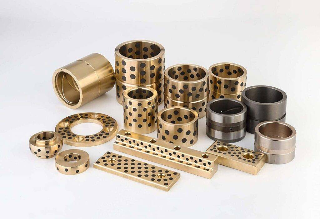 a range of brass bearing bushings and other components.