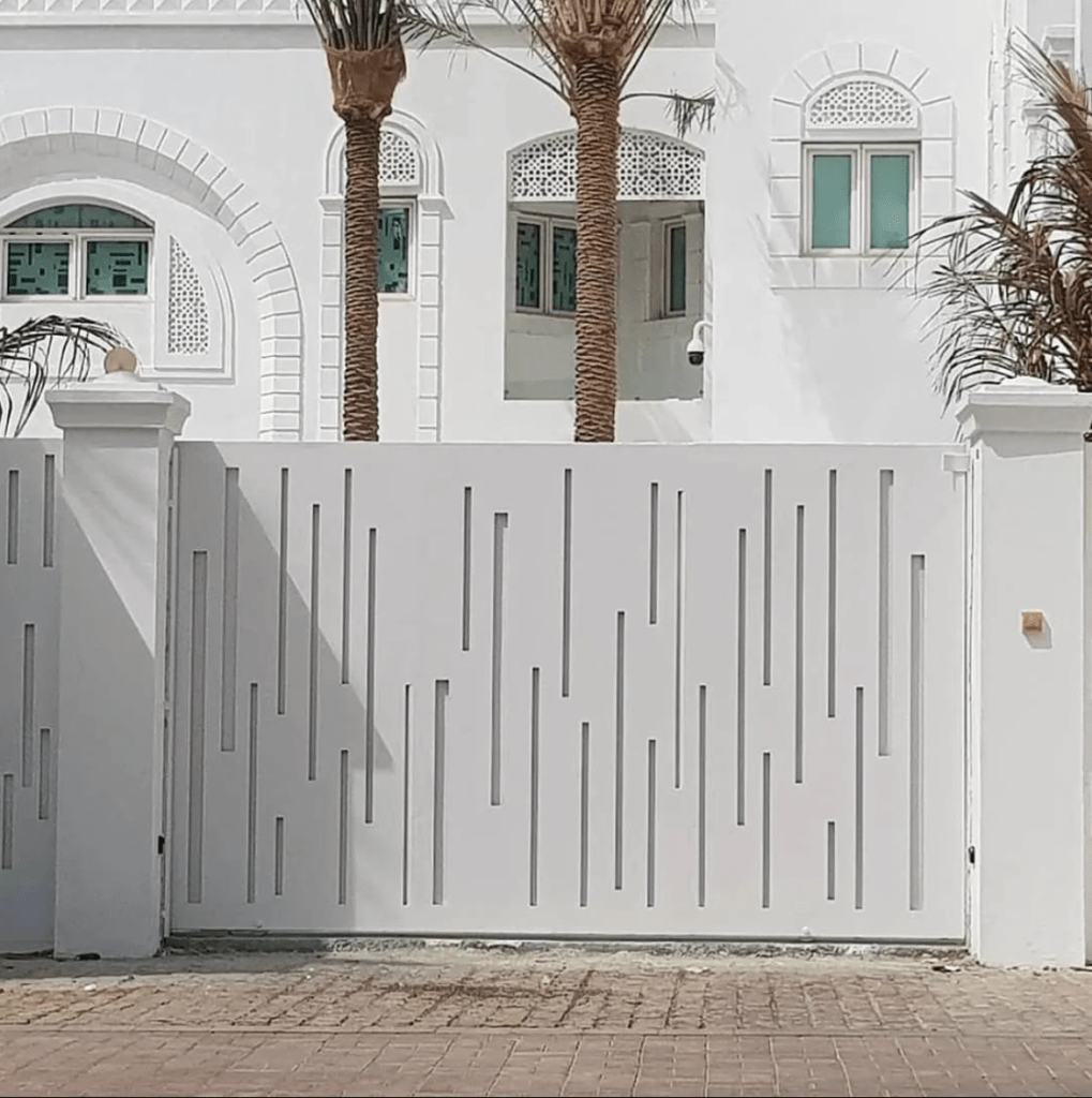 white-metal-gate-infront-of-house-gallery